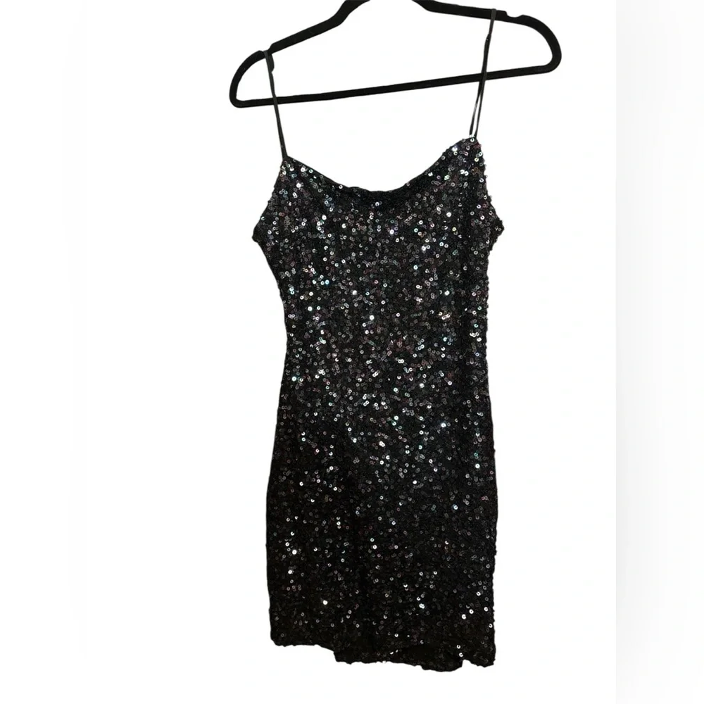 b darlin black sequin dress Barbie Basics with Brunette Hair in Black Dress and Pointed Boots –  Toyworld NZ main image 1